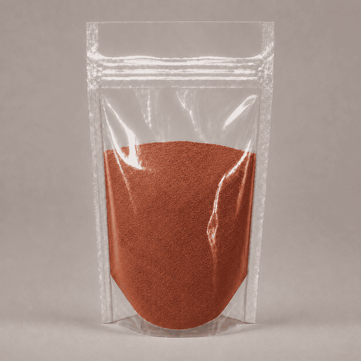 Kaffeebraunes Pulver in durchsichtiger Plastik Verpackung