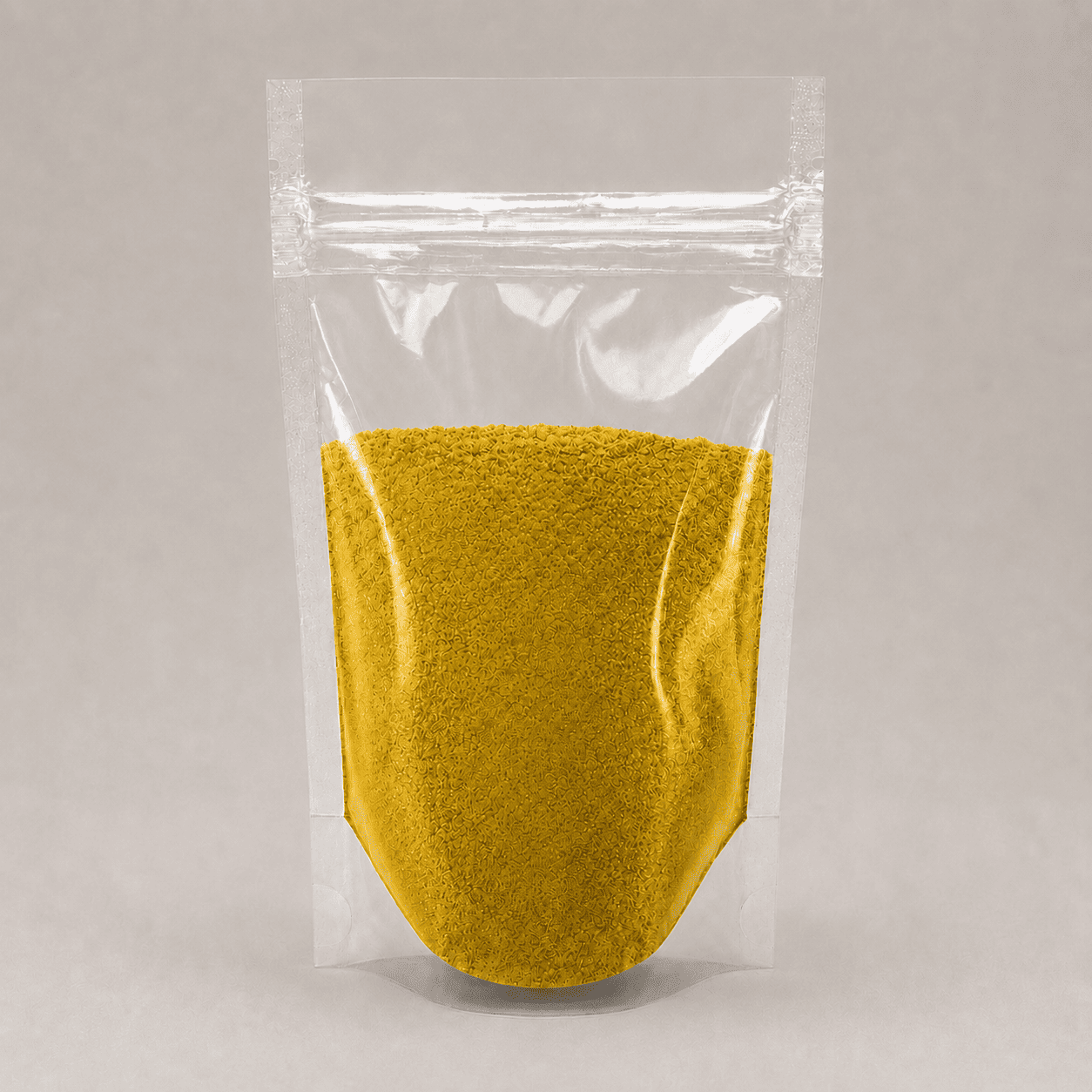 Gelbes Pulver in durchsichtiger Plastik Verpackung